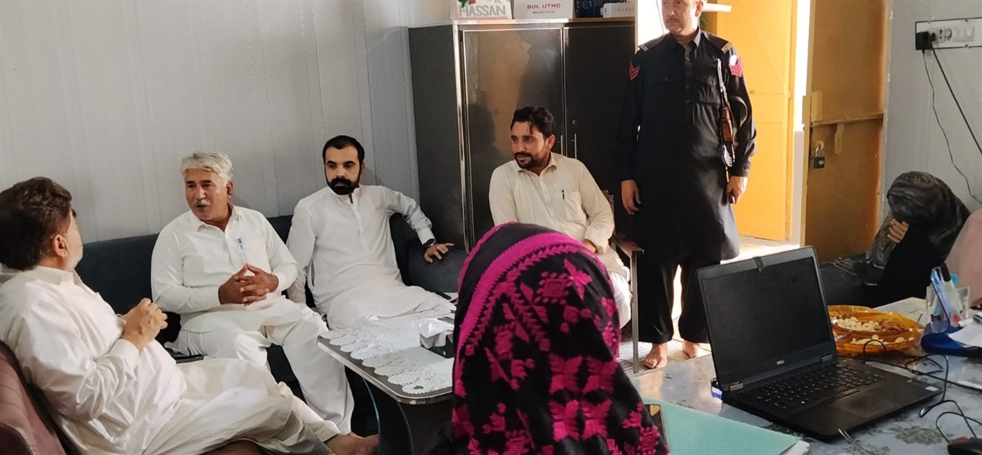 Relief Commissioner Iqbal Hussain meeting LEO members at the organization's office in Mardan