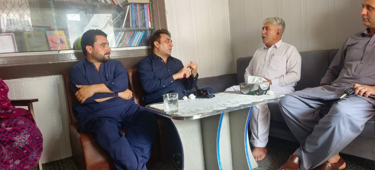 LEO board members and staff in strategic discussion at the organization's office in Mardan